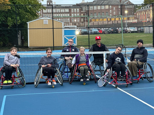 Group portrait of Cincinnati Tennis Foundation advanced wheelchair tennis participants.