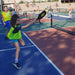 Cincinnati Tennis Foundation pickleball participant returning a serve.