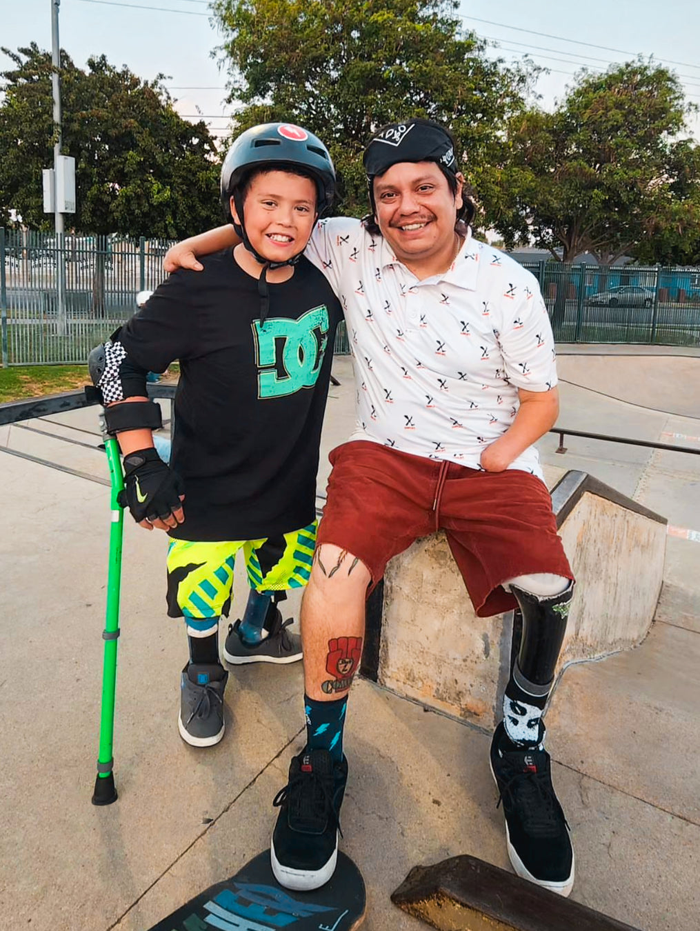 Team Amplife® Ambassador Oscar Loreto, Jr. after skating with a kid skater at his local skatepark while the wearing Amplife® Allover Polo.