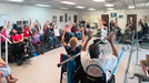 Group of Prosthetic Solutions patients enjoying yoga class through Fitness for Life.