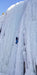 A Paradox Sports climber ascending the icewall at the Lake City Ice Skills 201.