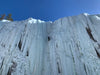 A Paradox Sports climber ascending the icewall at the Lake City Ice Skills 201.