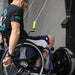 A CrossFitter using a wheelchair training with the Equip Products SkiErg Extensions in the gym.